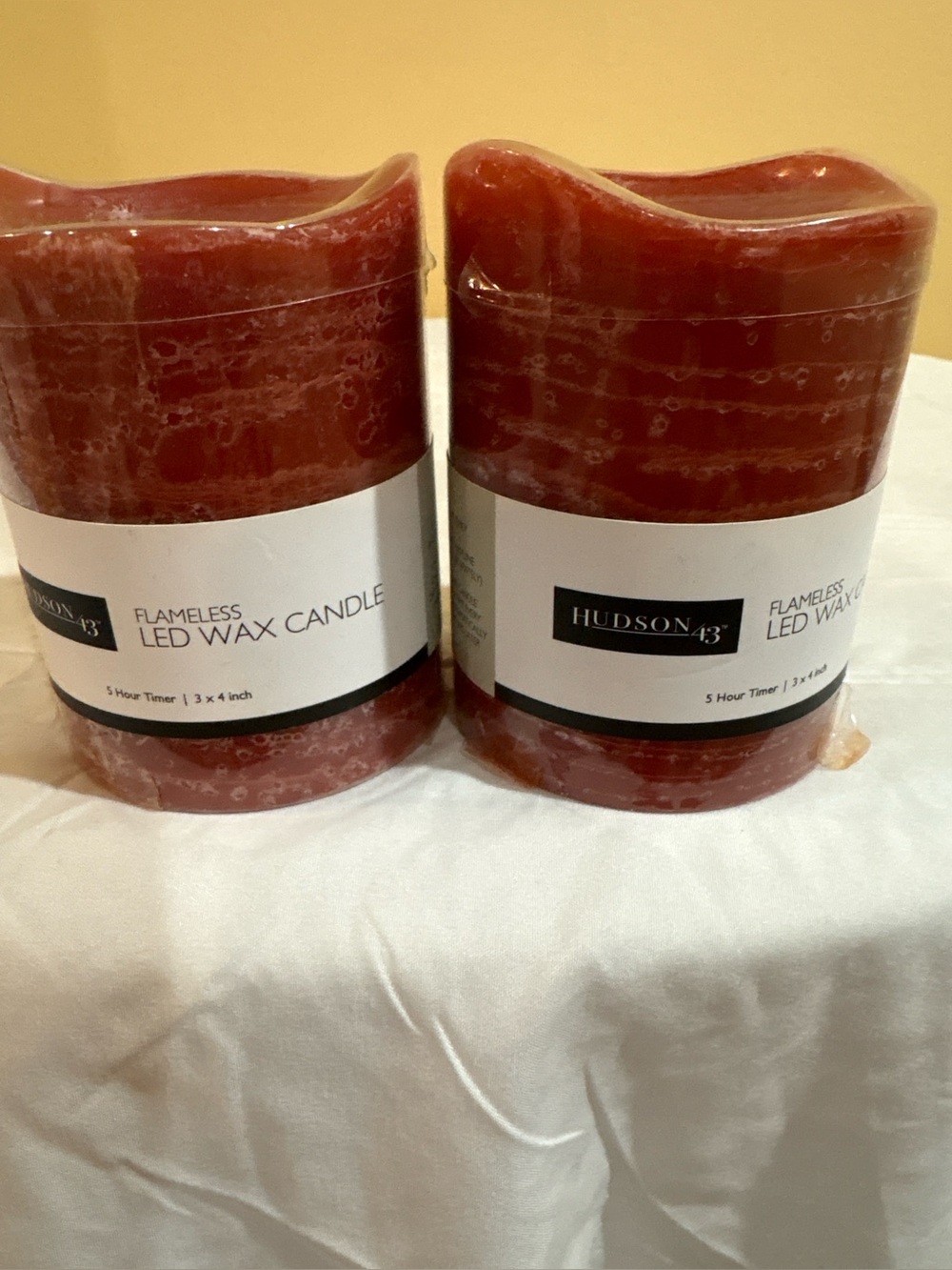 Hudson Jeans Pair of Red Flameless LED Wax Pillar Candles. NEW